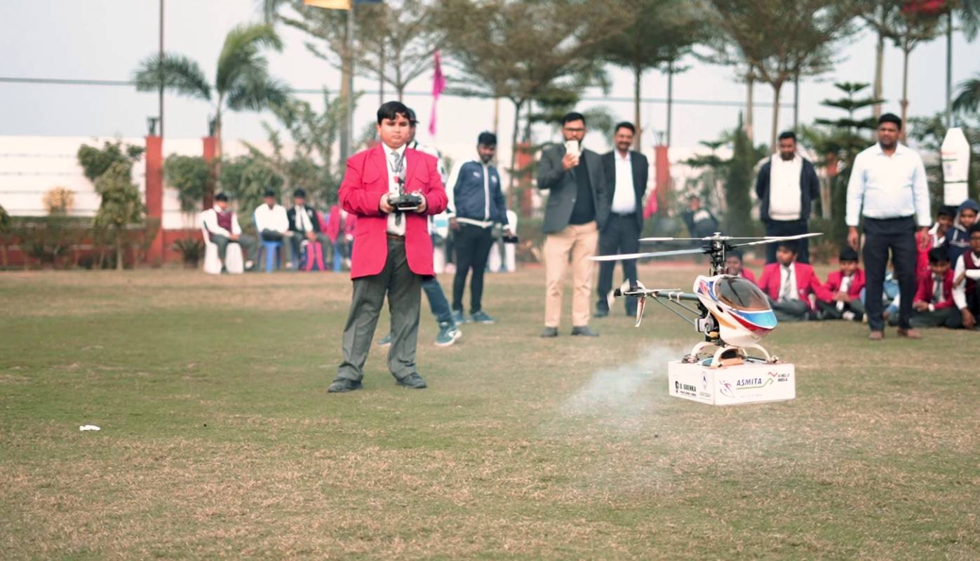 Students testing an AeroBay aerospace project outdoors